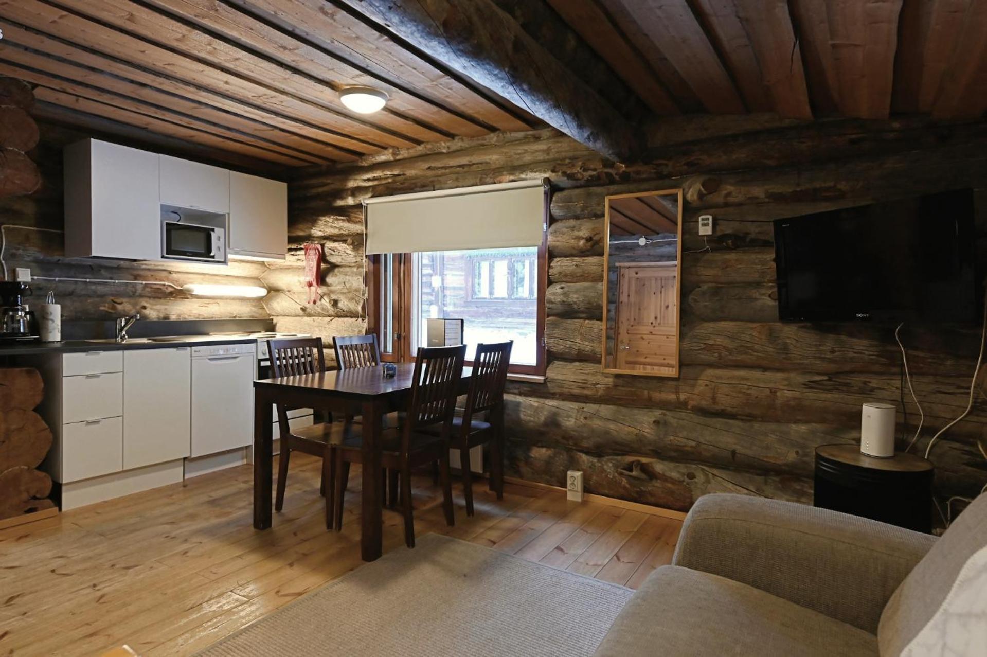 Classic Log Cabin Ski-In Ski-Out Леви Экстерьер фото